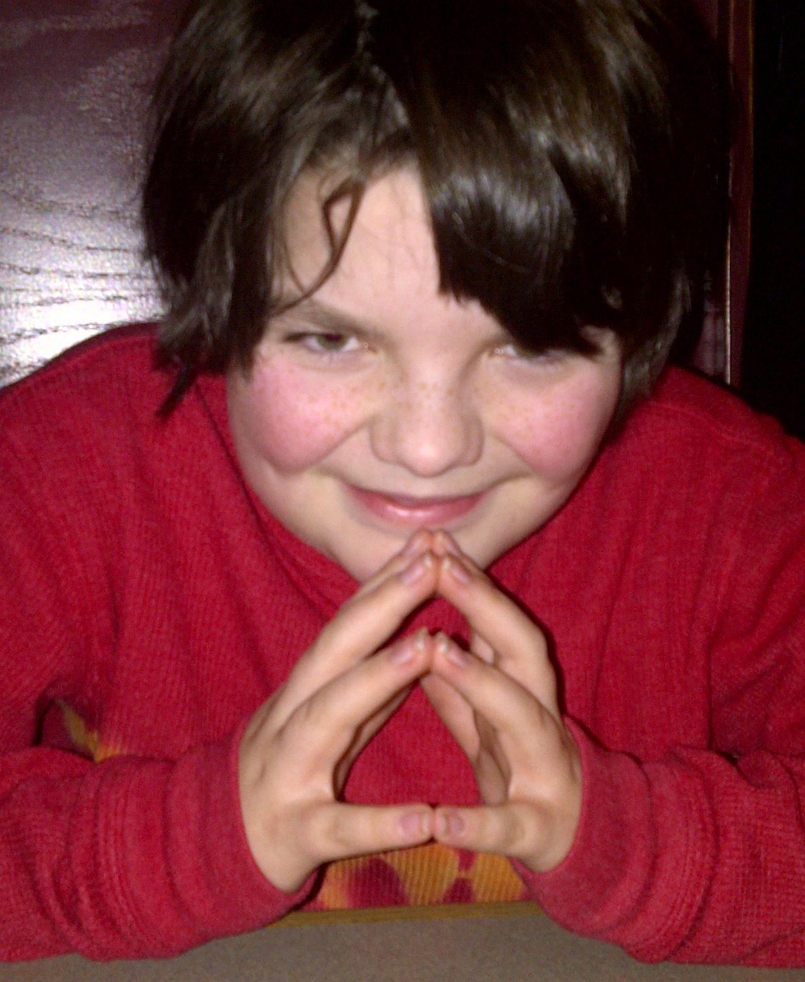 My son, grinning.