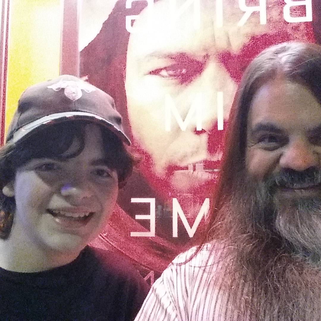 Owain and I posing before The Martian poster