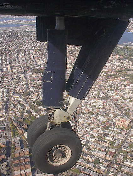 airplane wheel over city