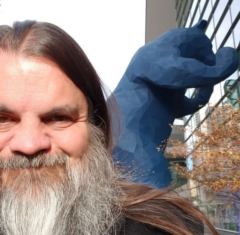 Bryan with Denver blue bear