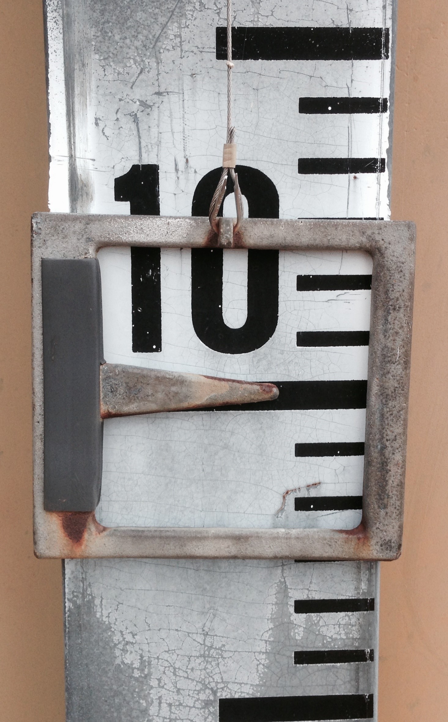 The number 10 on a gauge. 
